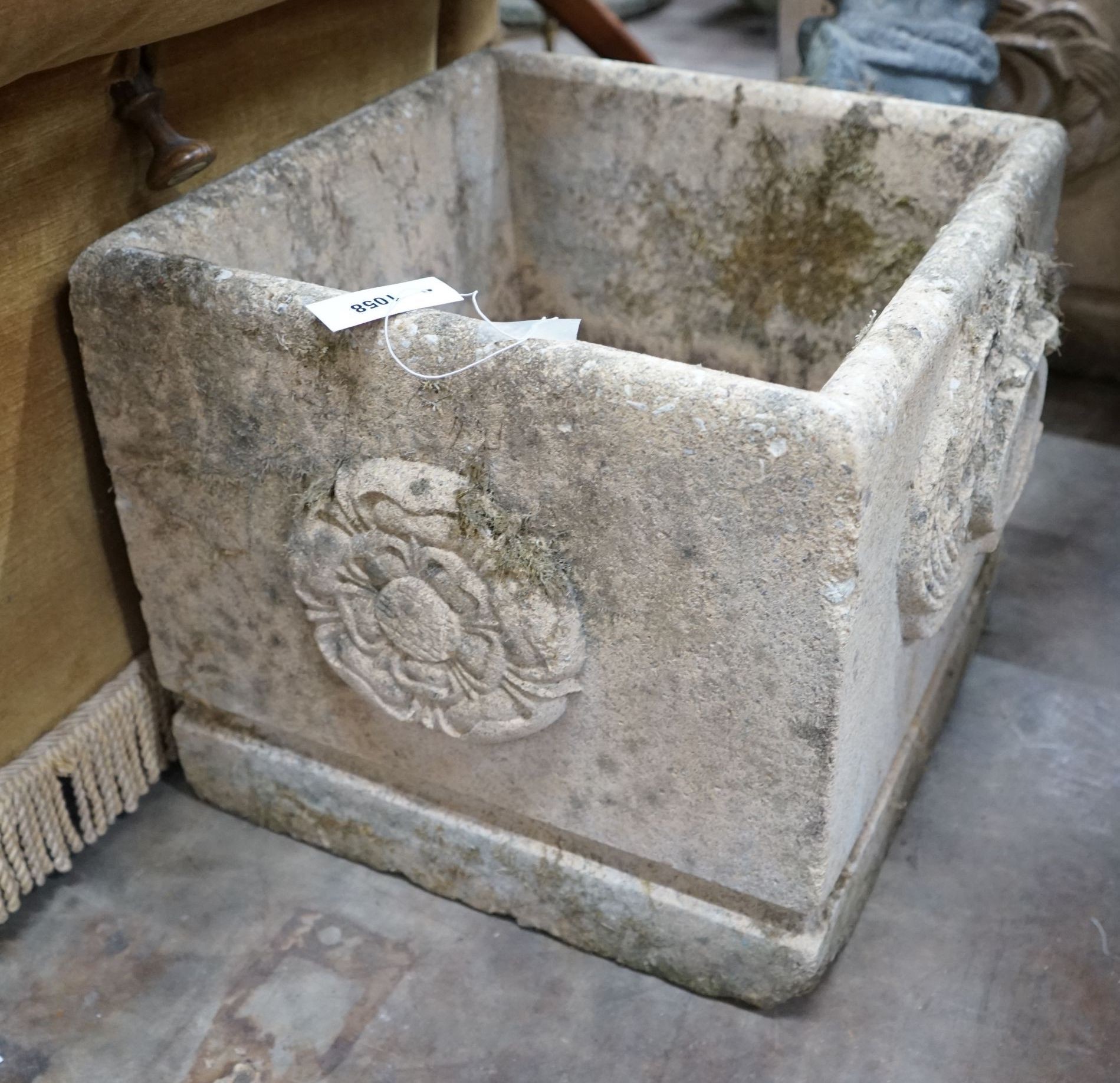 A pair of square reconstituted stone Fleurs de Lys garden planters, width 45cm, height 42cm